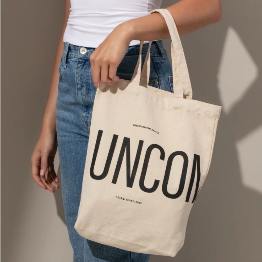 Uncommon James Cream Canvas Tote Bag with Bold Text